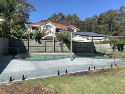 Five panel glass pool fence + black hardware