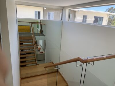 Four Mirror Install in Stairwell - Pelican Waters1